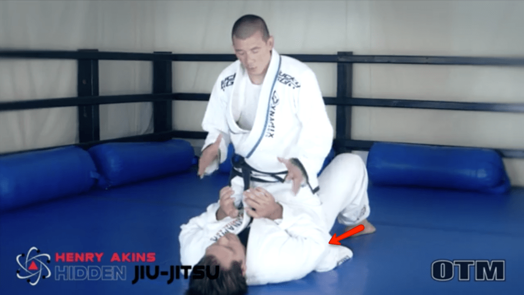 Henry Akins demonstrating the mount position for escaping bad positions in Jiu Jitsu