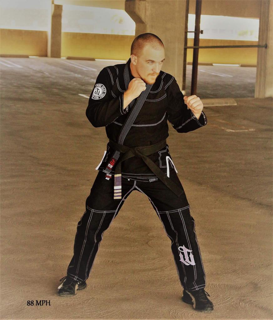 black gi boxing guard in parking garage