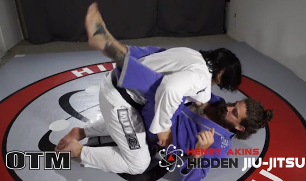 Henry Akins demonstrates posture breaking in BJJ during the closed guard instructional