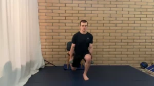 Dumbbell split squat bottom position by Jordan Fernandez