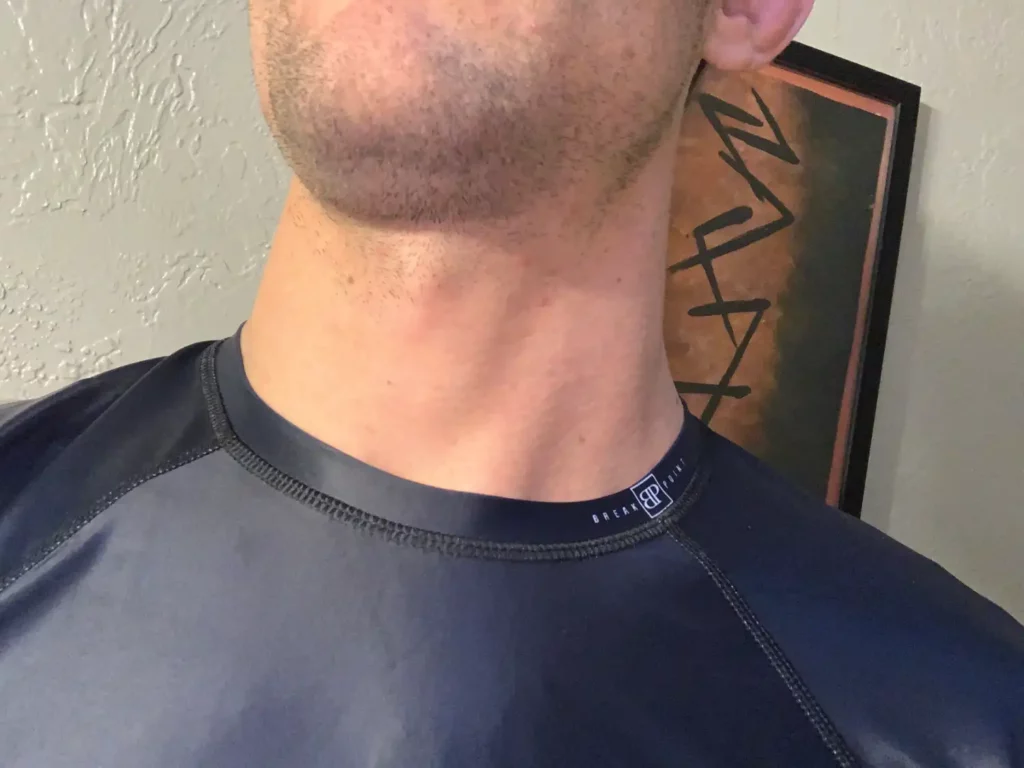 Jordan demonstating the Jiu Jitsu Life Rash Guard neck fit.